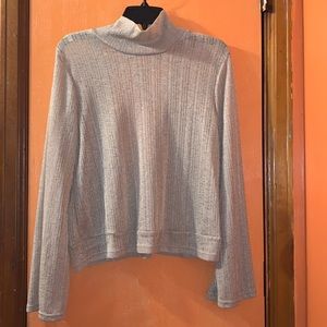 *3 for $25* Tan color knitted w/ string tie back out Blouse size medium